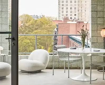 Spacious luxury residence at Embassy Terrazza Juhu with large windows and natural light.